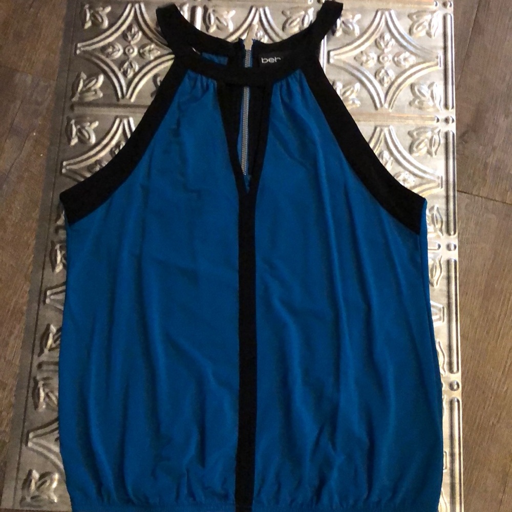 Bebe woman’s sleeveless top